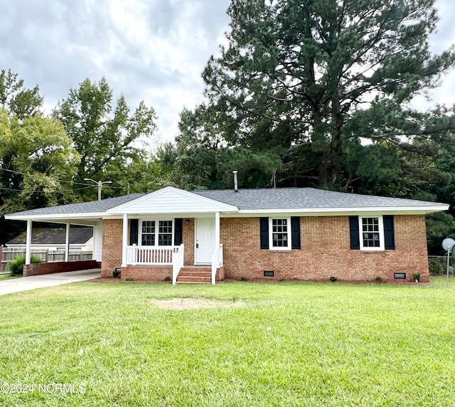 ranch-style house with a front lawn and a porch