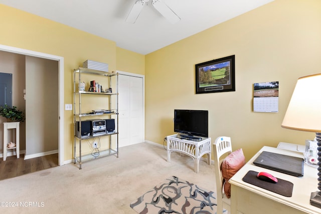 interior space with ceiling fan