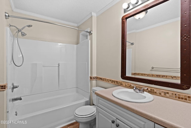 full bathroom with vanity, a textured ceiling, shower / bathing tub combination, ornamental molding, and toilet