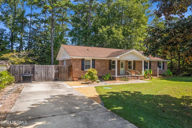 view of front of house with a front lawn and a porch