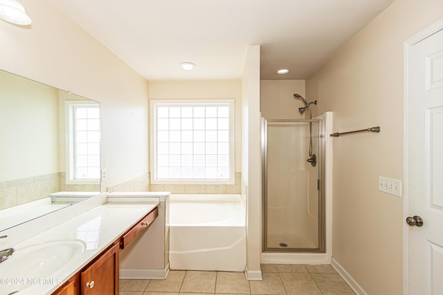 bathroom with vanity, tile patterned floors, and independent shower and bath