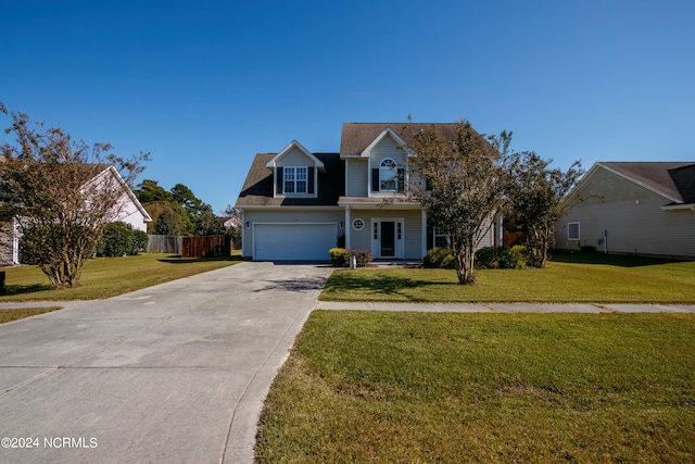 view of front facade featuring a front yard and a garage