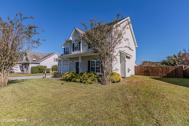 view of front facade with a front yard