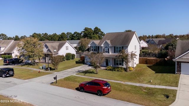 view of front of home with a front lawn