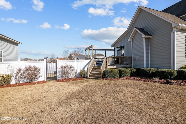 view of yard featuring a wooden deck