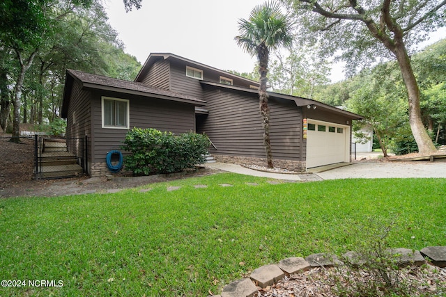 exterior space featuring a yard and a garage