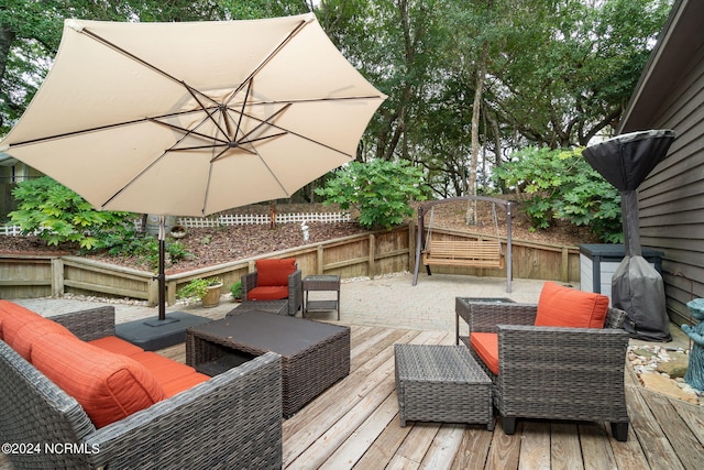 wooden deck featuring an outdoor hangout area