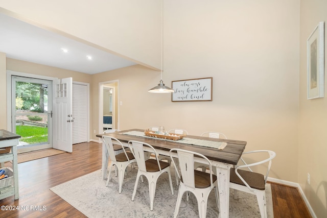 dining area with wood-type flooring