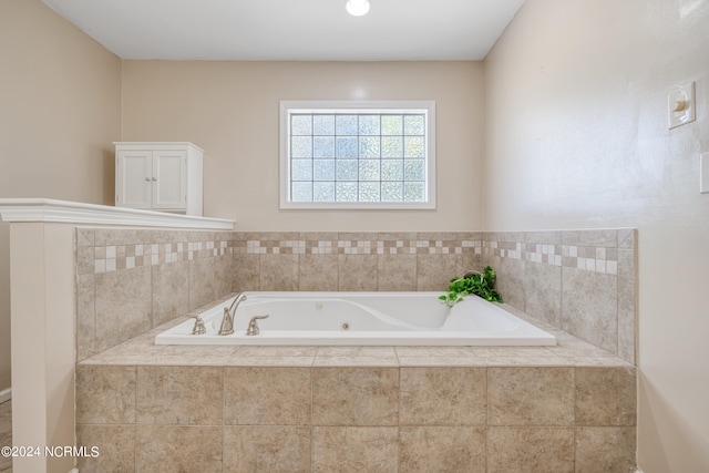 bathroom featuring a relaxing tiled tub