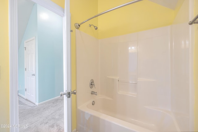 bathroom with shower / washtub combination