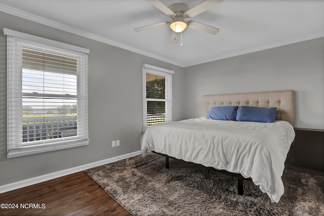 bedroom with ceiling fan, ornamental molding, and wood-type flooring