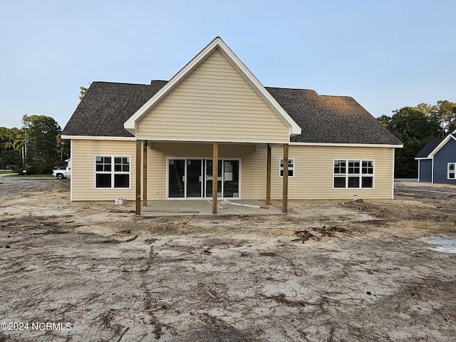 1514 Cricket Dr, Greenville, NC 27834 - rear view of property with a patio and roof with shingles