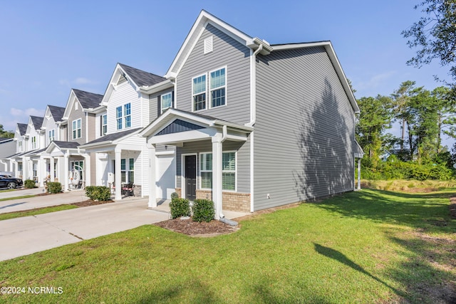 view of front facade with a front yard