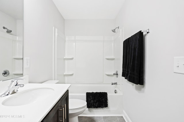 full bathroom featuring tub / shower combination, vanity, toilet, and tile patterned floors