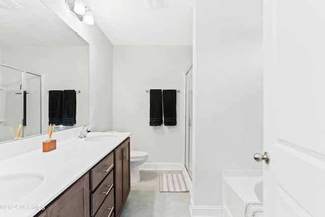 full bathroom with tile patterned flooring, independent shower and bath, vanity, and toilet