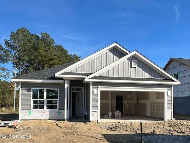 view of front of property with a garage