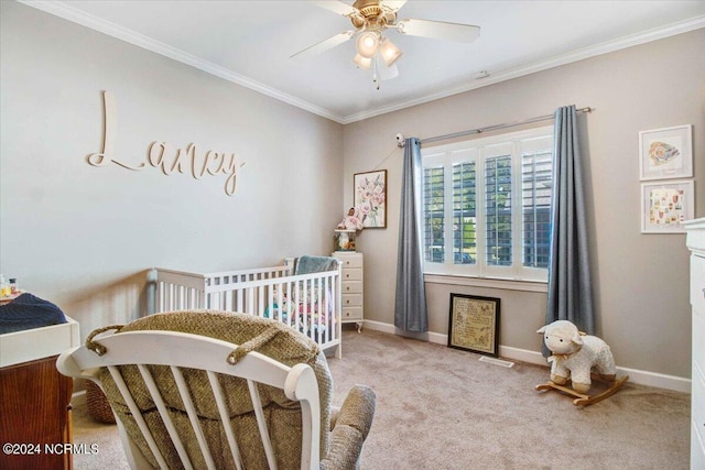 bedroom featuring ornamental molding, light colored carpet, ceiling fan, and baseboards