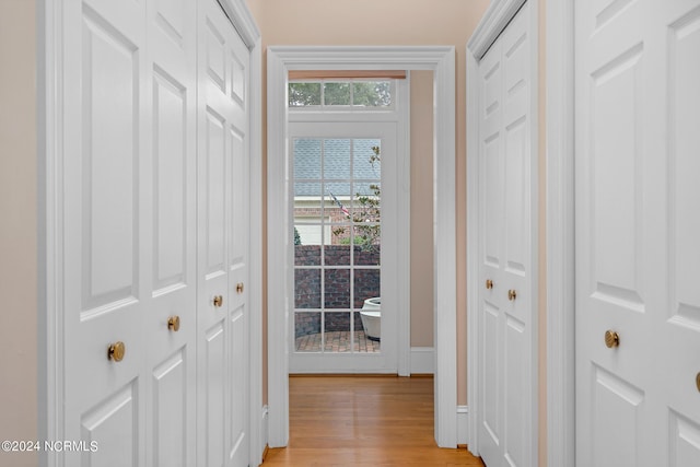 corridor featuring light hardwood / wood-style flooring