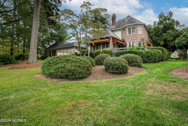 exterior space featuring a yard