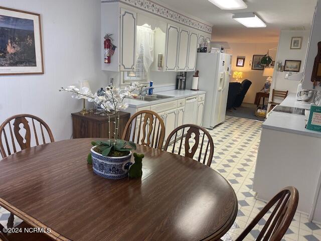 dining area featuring sink