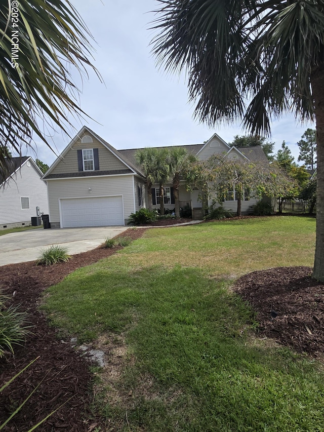 view of front of property featuring cooling unit, driveway, an attached garage, and a front lawn