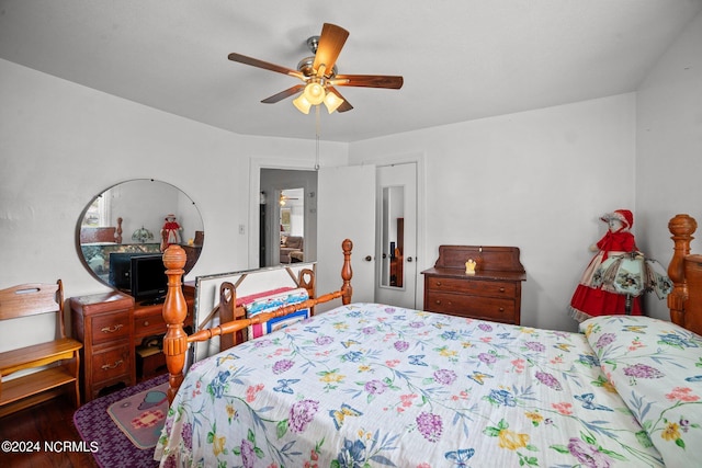 bedroom featuring ceiling fan and wood-type flooring