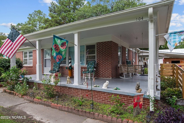 view of front of home featuring covered porch