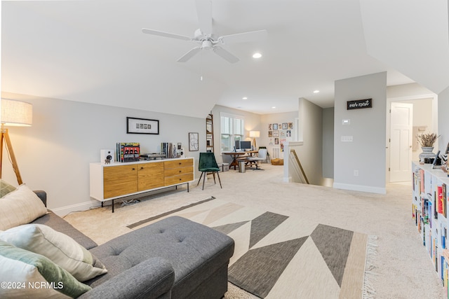 living room with light carpet and ceiling fan