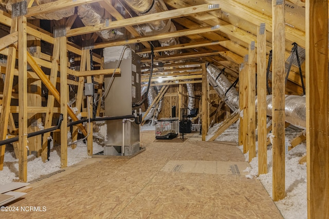 unfinished attic with heating unit