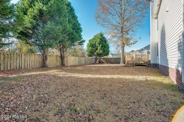 view of yard featuring a deck