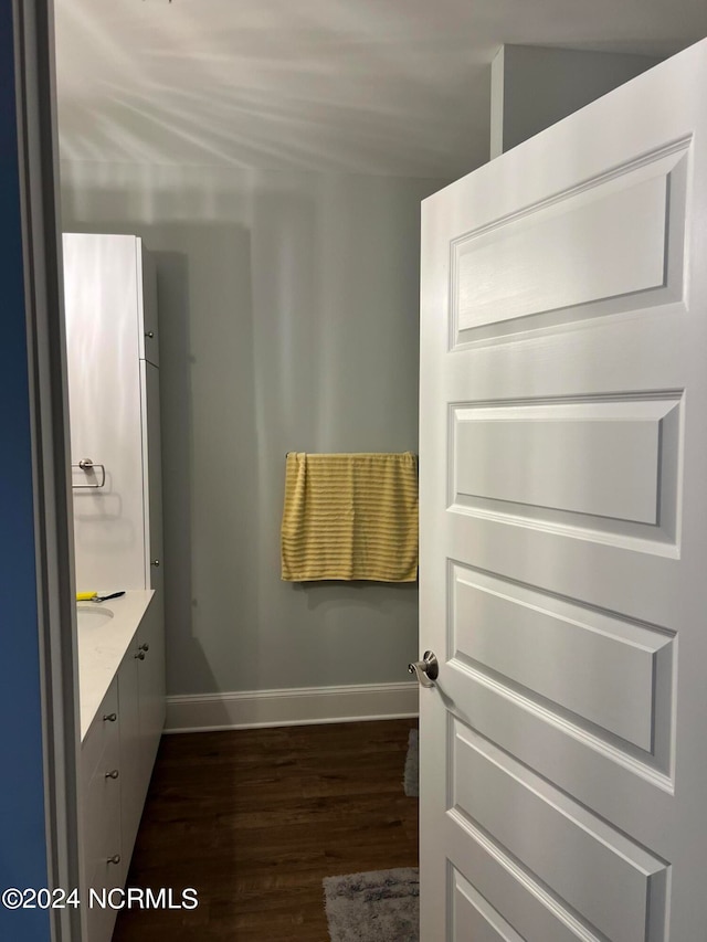 bathroom featuring vanity and hardwood / wood-style floors