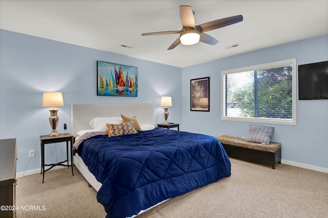 bedroom featuring ceiling fan and carpet floors