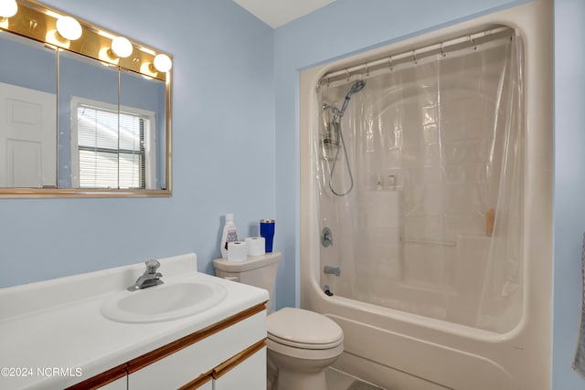 full bathroom featuring vanity, toilet, and shower / tub combo with curtain