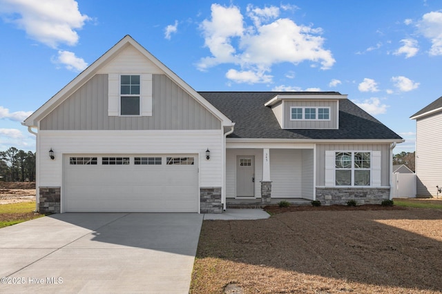 craftsman-style house with covered porch and a garage