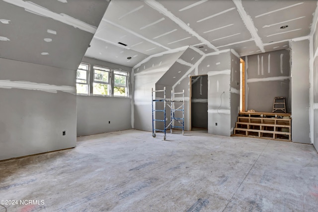 interior space featuring lofted ceiling