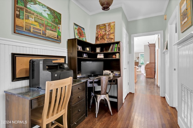 home office featuring dark hardwood / wood-style flooring and ornamental molding