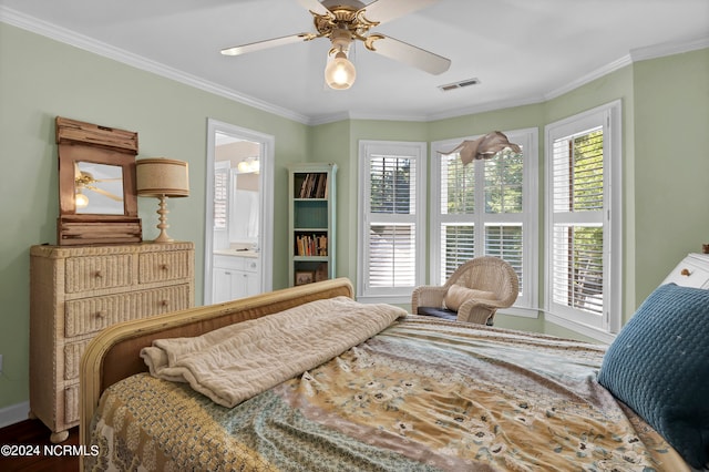 bedroom featuring ceiling fan, ornamental molding, ensuite bathroom, and hardwood / wood-style flooring