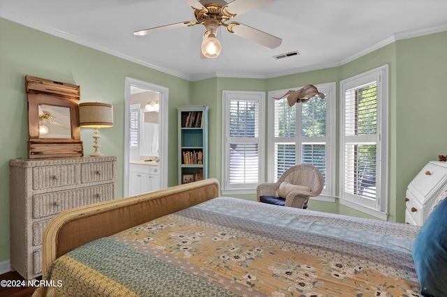 bedroom featuring ceiling fan, ornamental molding, ensuite bathroom, and hardwood / wood-style flooring