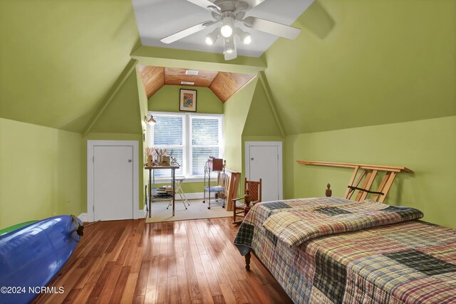 bedroom featuring lofted ceiling, hardwood / wood-style floors, and ceiling fan