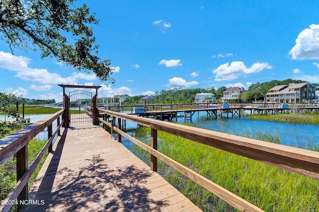 dock area featuring a water view