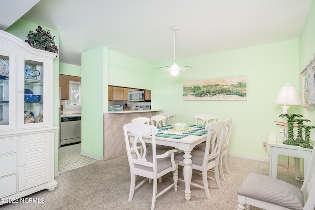 view of carpeted dining room