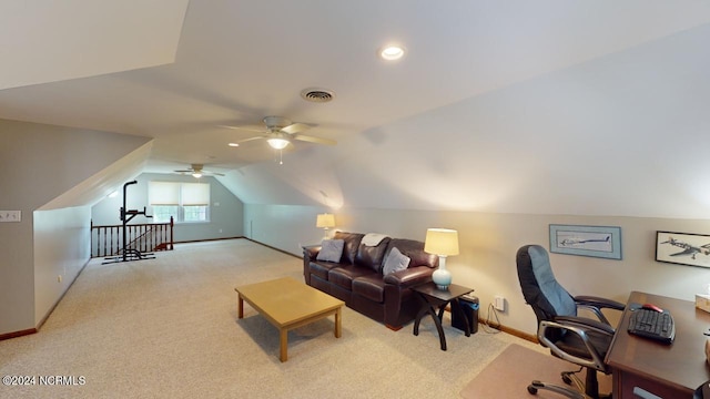 interior space with light carpet, lofted ceiling, and ceiling fan