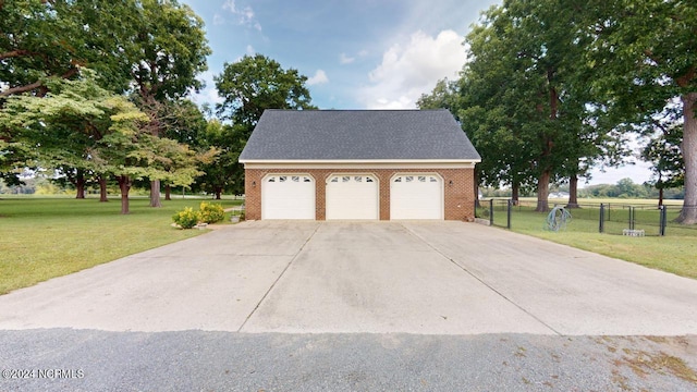 garage with a lawn