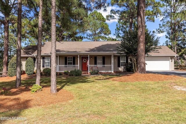 single story home featuring an attached garage, a front lawn, roof with shingles, covered porch, and driveway