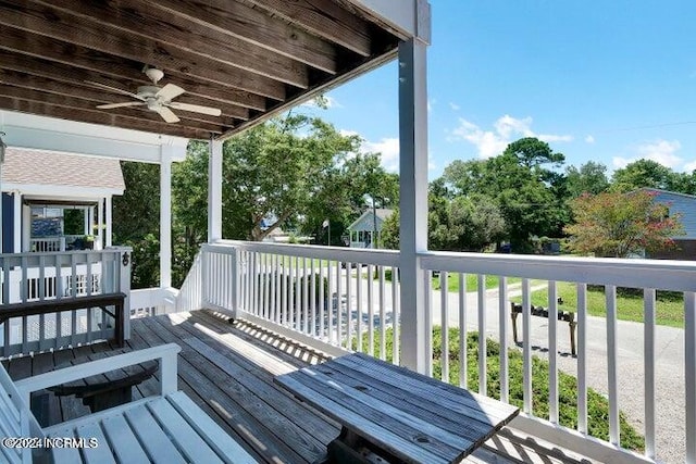 wooden deck with ceiling fan