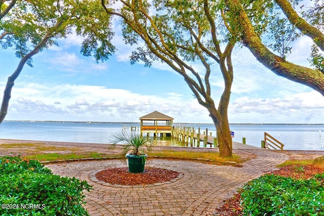 view of patio featuring a water view