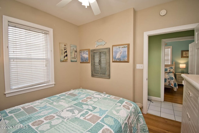 bedroom featuring wood-type flooring and ceiling fan