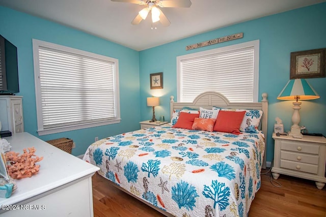 bedroom featuring ceiling fan and wood-type flooring