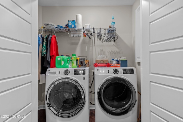 laundry room featuring washer and clothes dryer