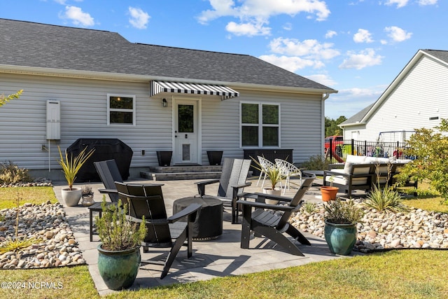 rear view of property with a patio area